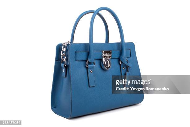 blue leather women's handbag on white background - handtasche stock-fotos und bilder