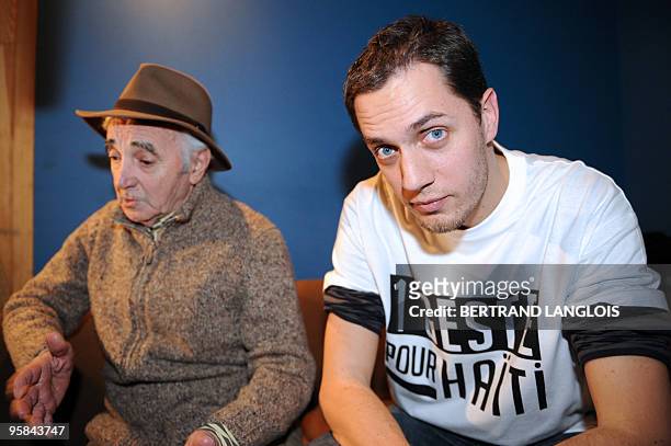 French singer Charles Aznavour and Slam poet Grand Corps Malade addresses journalists while recording, with a dozen of French rappers and pop stars,...