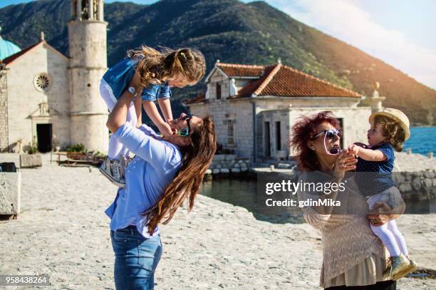 three-generation females family enjoying vacation - family trip in laws stock pictures, royalty-free photos & images