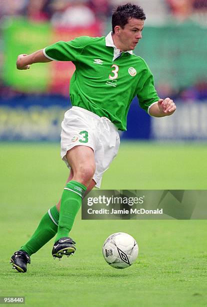 Ian Harte of Republic of Ireland runs with the ball during the FIFA World Cup 2002 Group Two Qualifying match against Portugal played at Lansdowne...