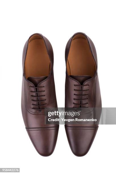 brown leather shoes isolated on white background - brown shoe stock pictures, royalty-free photos & images