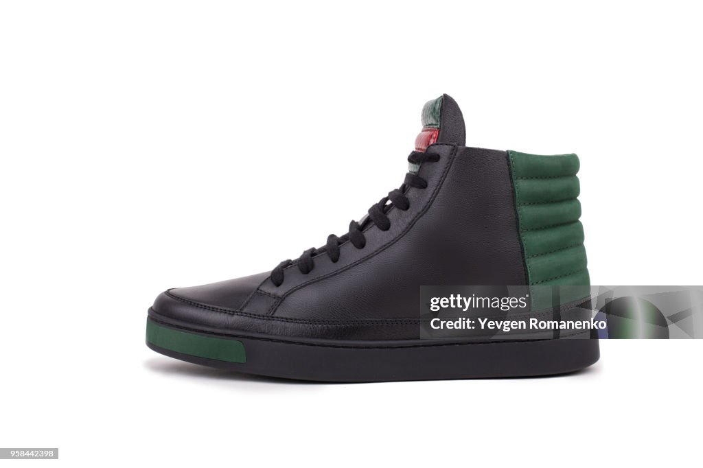 Side View of Black Leather high-top sneaker, isolated on white background