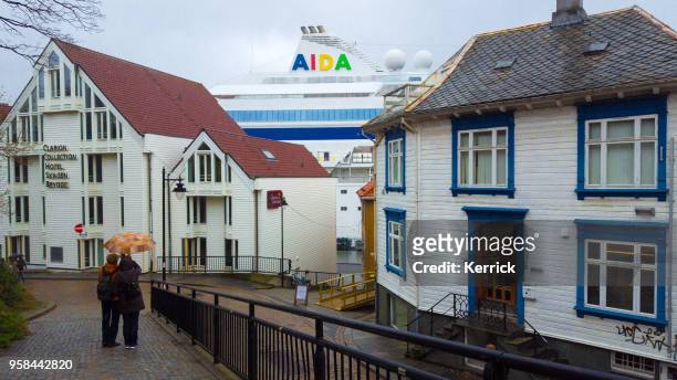 cruise ship aida cara over the roofs in stavanger norway - aida diva stock pictures, royalty-free photos & images