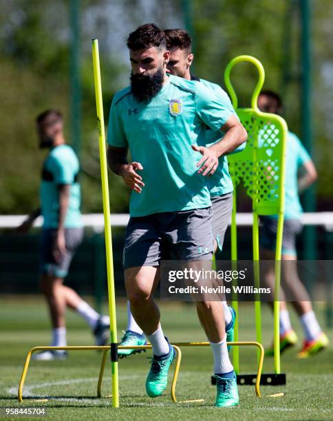 Mile Jedinak of Aston Villa in action during a training session at the club's training ground at The Recon Training Complex on May 14, 2018 in...