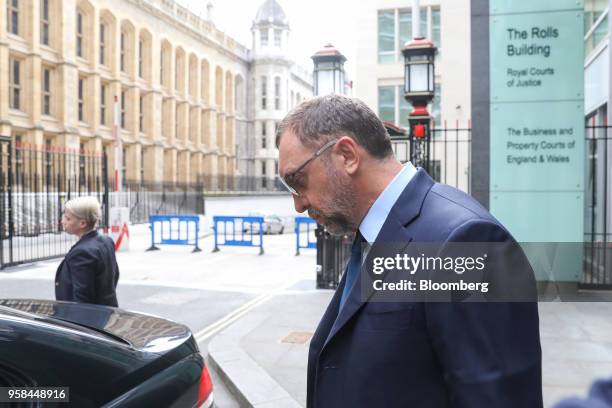 Oleg Deripaska, billionaire and president of United Co. Rusal Plc, leaves after attending the court hearing on MMC Norilsk Nickel PJSC at The Rolls...