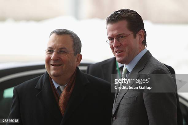 German Defense Minister Karl-Theodor zu Guttenberg greets Israeli Defense Minister Ehud Barak upon Barak's arrival at the Chancellery on January 18,...
