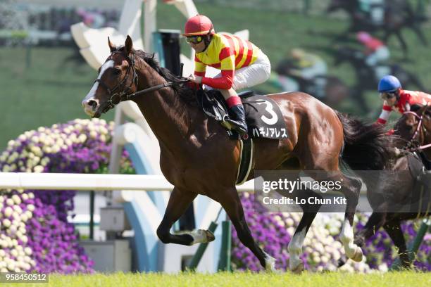 Jockey Mirco Demuro riding Hagino Ares wins the Race 9 Kamogawa Tokubetsu at Kyoto Racecourse on May 5, 2018 in Kyoto, Japan.