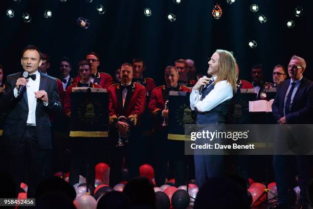 Old Vic artistic director Matthew Warchus speaks as Tim Minchin looks on at The Old Vic Bicentenary Ball to celebrate the theatre's 200th birthday at...