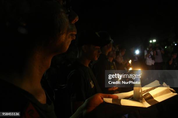 Dozens of people from Surabaya city, who are members of Surabaya soccer supporters , held a solidarity action in Taman Suropati, Jakarta on Monday,...