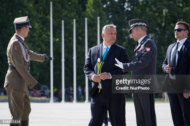 Hungarian Prime Minister Viktor Orban lay flowers at the Monument to the victims of the Smolensk crash in Warsaw, Poland on 14 May 2018