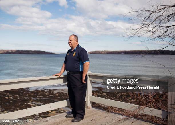 Kevin Battle poses for a portrait at the waterfront near SMCC. Battle, who is the Portland Harbor Master, took a genetic test in January and found a...