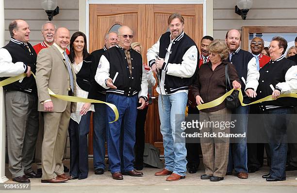 Country Artist Darryl Worley cuts the ribbon and opens Darryl Worleys Worley Bird Saloon during the Country Crossing Grand Opening Kick-Off...