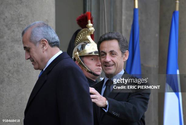 French President Nicolas Sarkozy welcomes his Lebanese counterpart Michel Sleiman prior to a meeting on January 2, 2010 at the Elysee presidential...