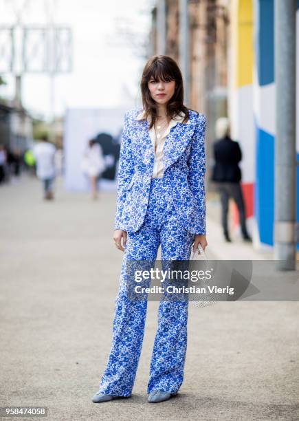 Model Georgia Fowler wearing a blue suit, pearl jacket during Mercedes-Benz Fashion Week Resort 19 Collections at Carriageworks on May 14, 2018 in...