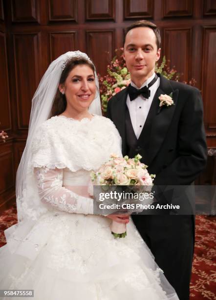 The Bow Tie Asymmetry" - Pictured Behind the Scenes: Amy Farrah Fowler and Sheldon Cooper . When Amy's parents and Sheldon's family arrive for the...