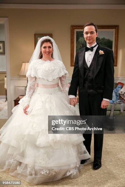 The Bow Tie Asymmetry" - Pictured Behind the Scenes: Amy Farrah Fowler and Sheldon Cooper . When Amy's parents and Sheldon's family arrive for the...