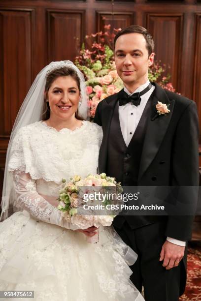 The Bow Tie Asymmetry" - Pictured Behind the Scenes: Amy Farrah Fowler and Sheldon Cooper . When Amy's parents and Sheldon's family arrive for the...