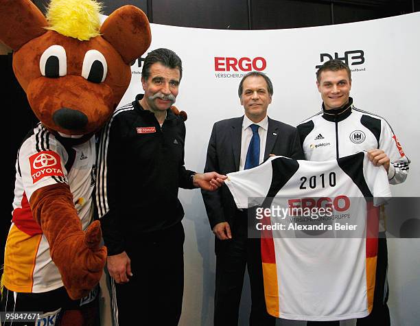 German handball national coach Heiner Brand , German handball national player Michael Kraus , Thomas Schoellkopf , member of the board of ERGO...