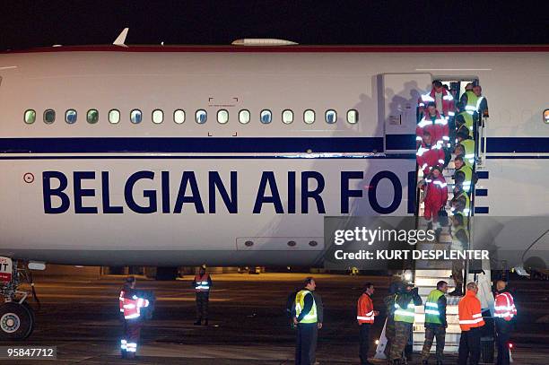 Members of the B-Fast search, Belgian rescue team and Belgians, Dutch and other European citizens, evacuated from Haiti after a massive earthquake,...