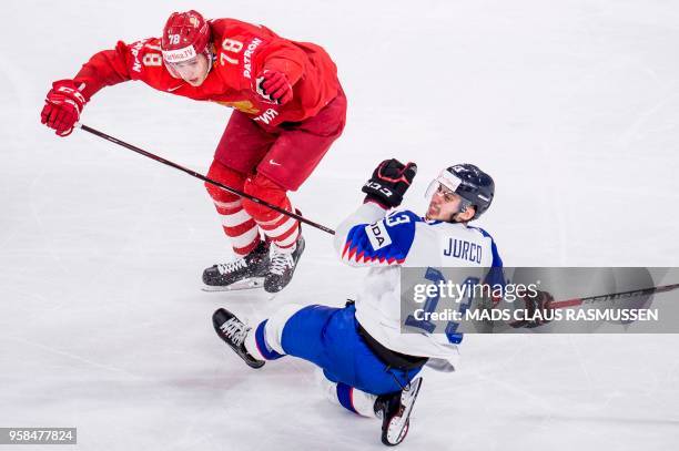 Russia's Maxim Mamin and Slovakia's Tomas Jurco vie during the group A match Russia vs Slovakia of the 2018 IIHF Ice Hockey World Championship at the...