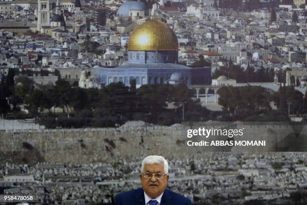 Palestinian Authority President Mahmud Abbas adresses the Palestinian leadership in the West Bank city of Ramallah on May 14, 2018. Abbas condemned...