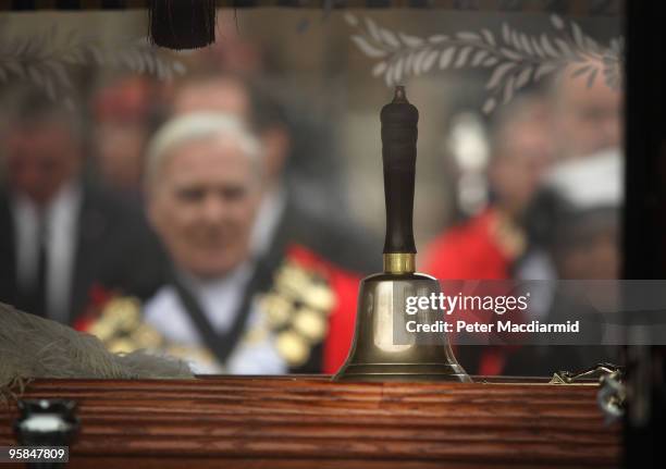 The coffin of London town crier Peter Moore is adorned with his bell after a requiem mass held at St George's Cathedral on January 18, 2010 in...