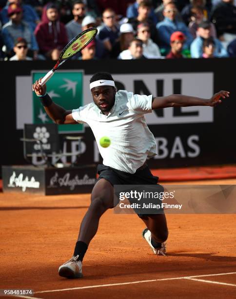 Frances Tiafoe of USA plays a forehand in his match against Matteo Berrettini of Italy during day two of the Internazionali BNL d'Italia 2018 tennis...