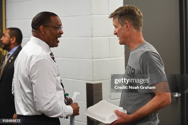 Head Coaches Alvin Gentry of the New Orleans Pelicans and Steve Kerr of the Golden State Warriors chat before Game Four of the Western Conference...