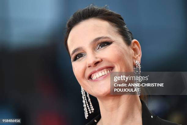 French actress and member of the Un Certain Regard jury Virginie Ledoyen poses as she arrives on May 14, 2018 for the screening of the film...