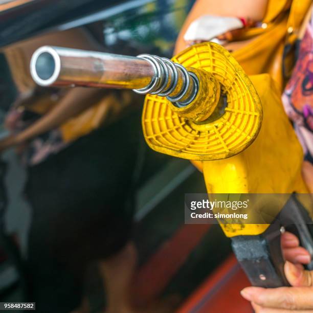 petrol gun - oil pump stock pictures, royalty-free photos & images