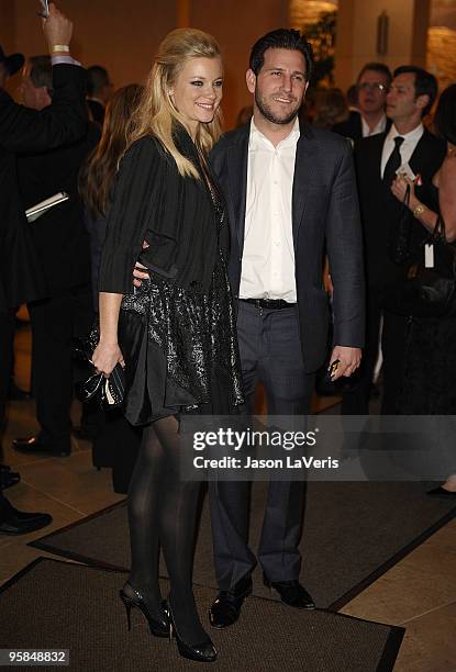 Actress Amy Smart and actor Branden Williams depart the 67th annual Golden Globe Awards at the Beverly Hilton Hotel on January 17, 2010 in Los...