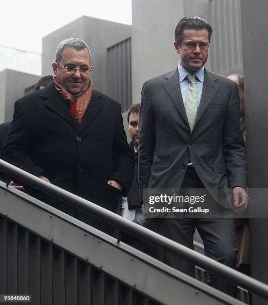 German Defense Minister Karl-Theodor zu Guttenberg and Israeli Defense Minister Ehud Barak arrive at the underground Holocaust Memorial museum on...