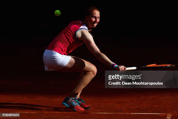 Alison Van Uytvanck of Belgium returns a backhand in her match against Samantha Stosur of Australia during day two of the Internazionali BNL d'Italia...