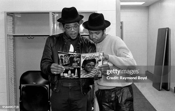 Rappers DMC and Run of Run DMC poses for photos backstage during ‘The Swatch Watch New York City Fresh Festival ‘84’at the U.I.C. Pavilion in...