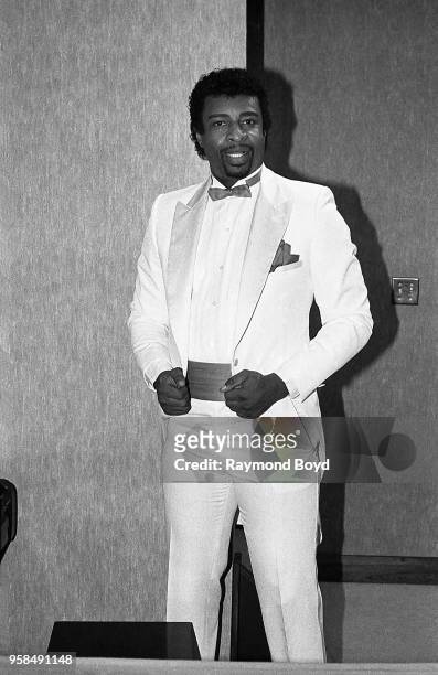 Singer Dennis Edwards poses for photos backstage at The Holiday Star Theatre in Merrillville, Indiana in 1984.