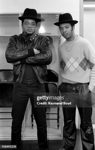 Rappers DMC and Run of Run DMC poses for photos backstage during ‘The Swatch Watch New York City Fresh Festival ‘84’at the U.I.C. Pavilion in...