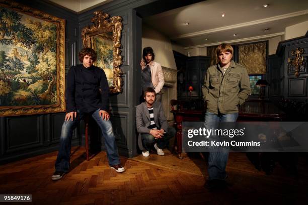 Posed group portrait of English band Kasabian. Left to right are Christopher Karloff, Tom Meighan, Sergio Pizzorno and Chris Edwards in Kensington,...