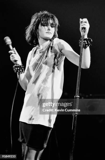 Siouxsie Sioux performs on stage with Siouxsie and the Banshees at the Apollo in Manchester, England on October 14, 1980.