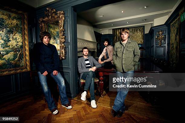 Posed group portrait of English band Kasabian. Left to right are Christopher Karloff, Tom Meighan, Sergio Pizzorno and Chris Edwards in Kensington,...