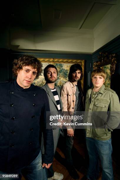 Posed group portrait of English band Kasabian. Left to right are Christopher Karloff, Tom Meighan, Sergio Pizzorno and Chris Edwards in Kensington,...