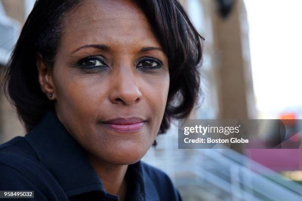 Boston Firefighter Yvette Ram poses for a portrait at the Boston Fire Department headquarters in Boston on April 28, 2018. There are just 16 female...