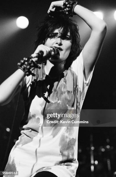 Siouxsie Sioux performs on stage with Siouxsie and the Banshees at the Apollo in Manchester, England on October 14, 1980.