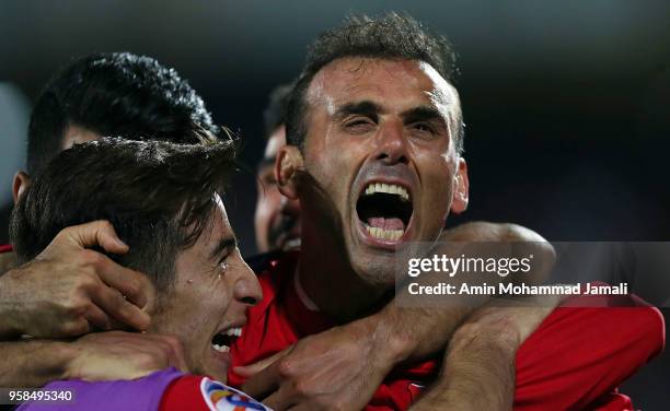 Seyed Jalal Hosseini of Persepolis celebrates after second goal during AFC Champions League match between Persepolis and Al Jazira at Azadi Stadium...