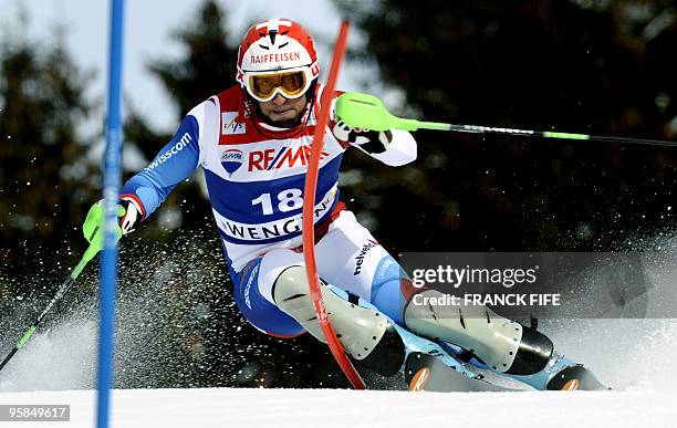 Swiss Silvan Zurbriggen clears a gate during the 2nd round of the FIS World Cup Men's Super combined-Slalom in Wengen on January 15, 2010. Miller won...