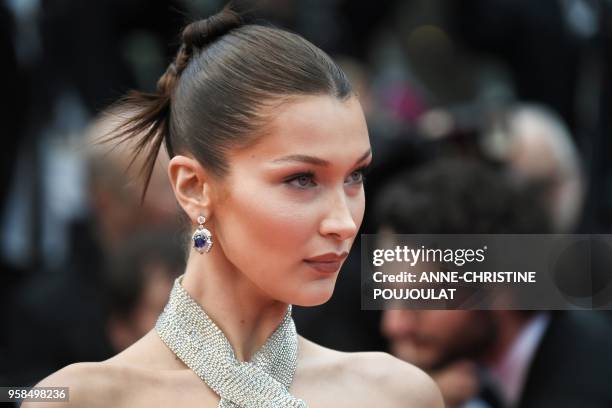 Model Bella Hadid poses as she arrives on May 14, 2018 for the screening of the film "BlacKkKlansman" at the 71st edition of the Cannes Film Festival...