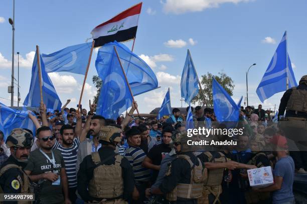 Hundreds of Turkmen block the Kirkuk- Bagdad road as they have taken to the streets to protest alleged electoral fraud, in Kirkuk on May 14, 2018....