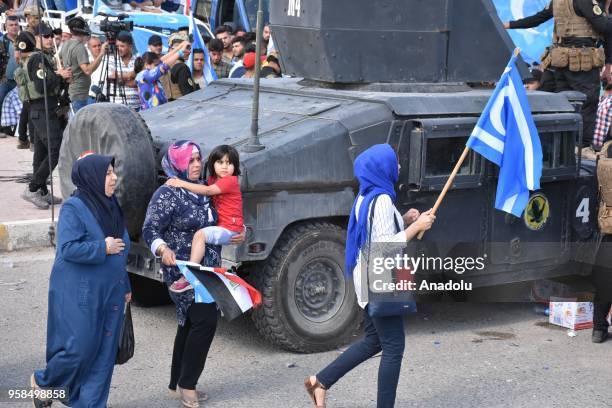 Hundreds of Turkmen block the Kirkuk- Bagdad road as they have taken to the streets to protest alleged electoral fraud, in Kirkuk on May 14, 2018....