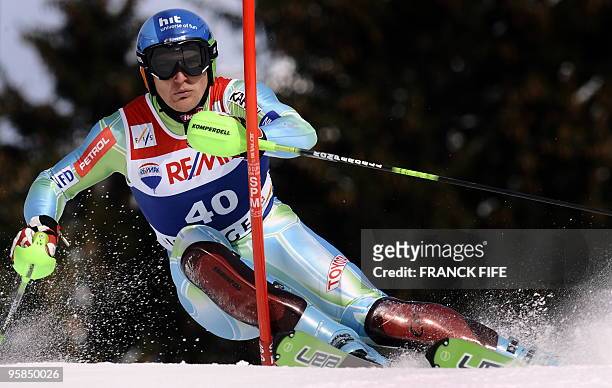 Slovenian Andrej Sporn clears a gate during the second round of the FIS World Cup Men's Super combined-Slalom in Wengen on January 15, 2010. Us Bode...