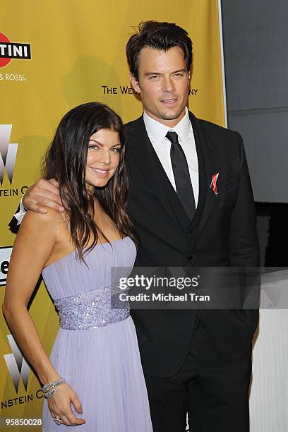 Stacy "Fergie" Ferguson and Josh Duhamel arrive to The Weinstein Company - 2010 Golden Globes Afterparty held at Bar 210 inside The Beverly Hilton...