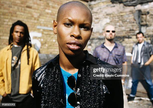 Group portrait of British band Skunk Anansie. Left to right are bassist Cass , lead singer Skin , guitarist Ace and drummer Mark Richardson in 1995.